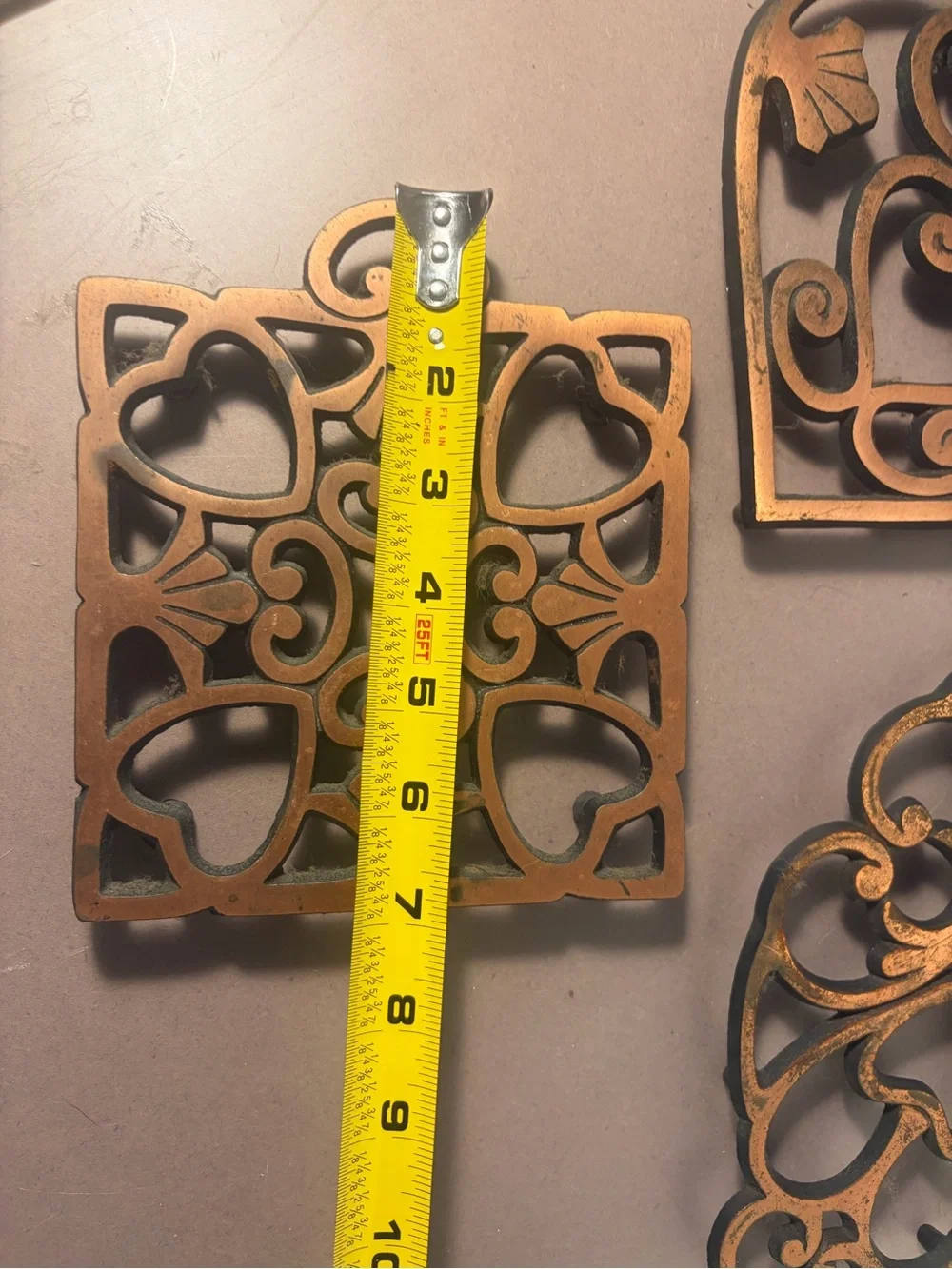 Pampered Chef Copper-Tone Decorative Cast Iron Trivets Set